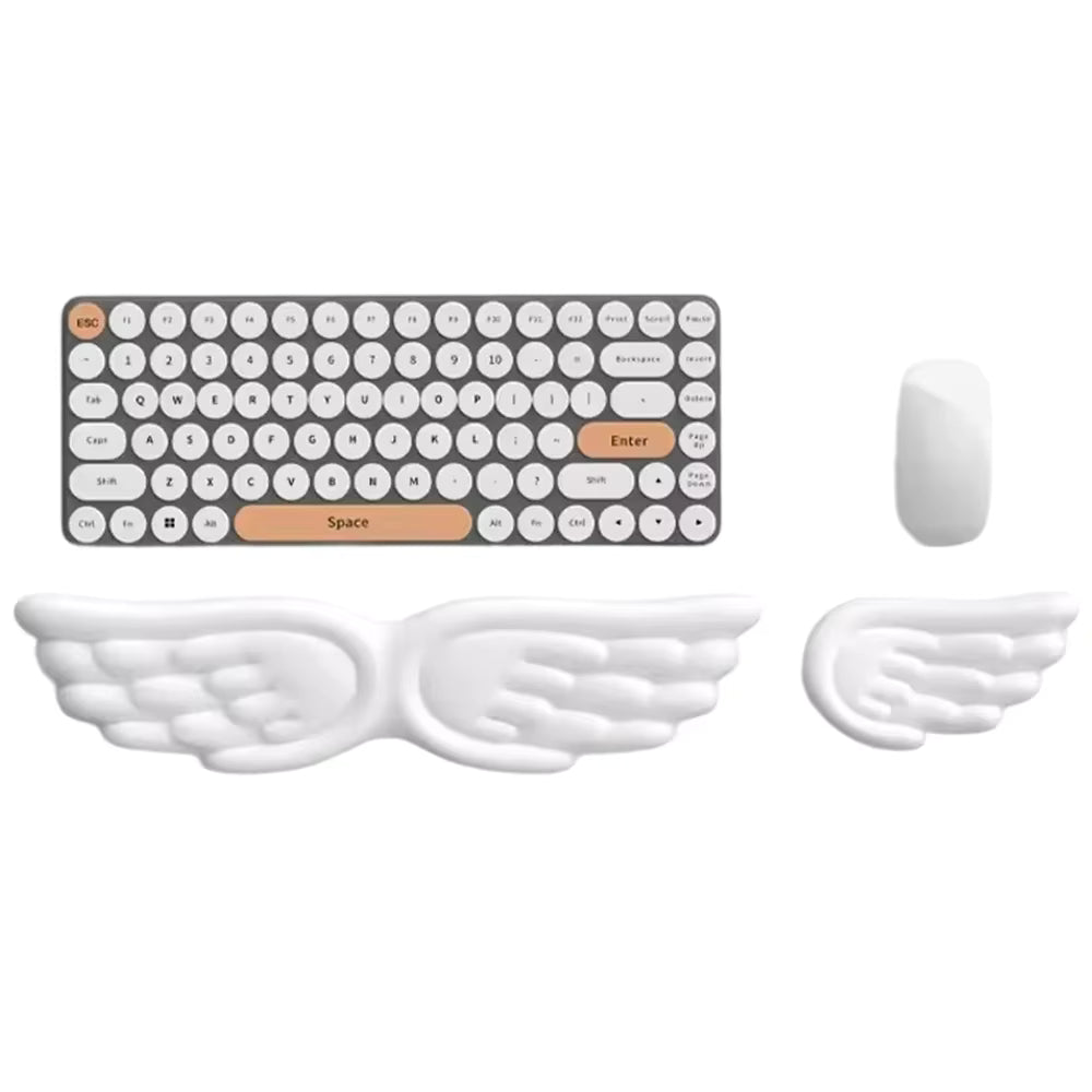 Angel-Wing wrist rest cross-section showing PU leather surface, memory foam core, and anti-slip silicone backing