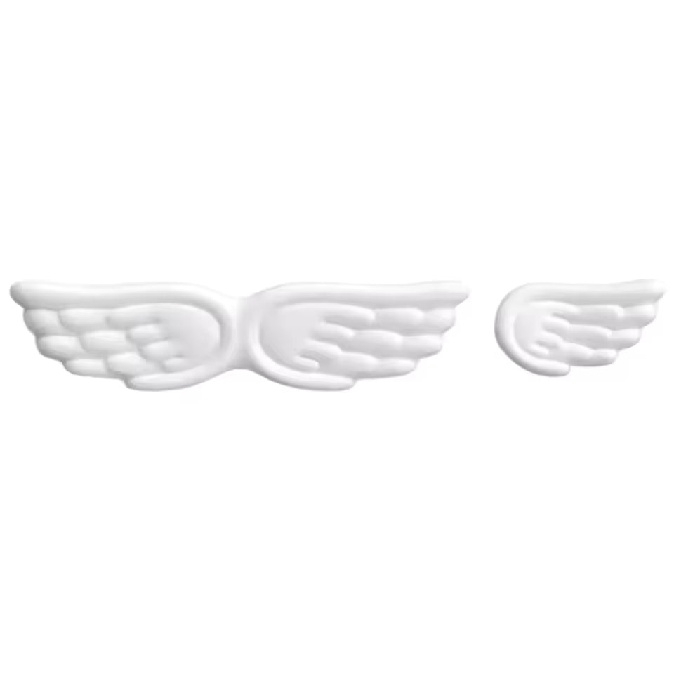 Hand holding Angel-Wing wrist rest, demonstrating flexible memory foam and ergonomic contour design