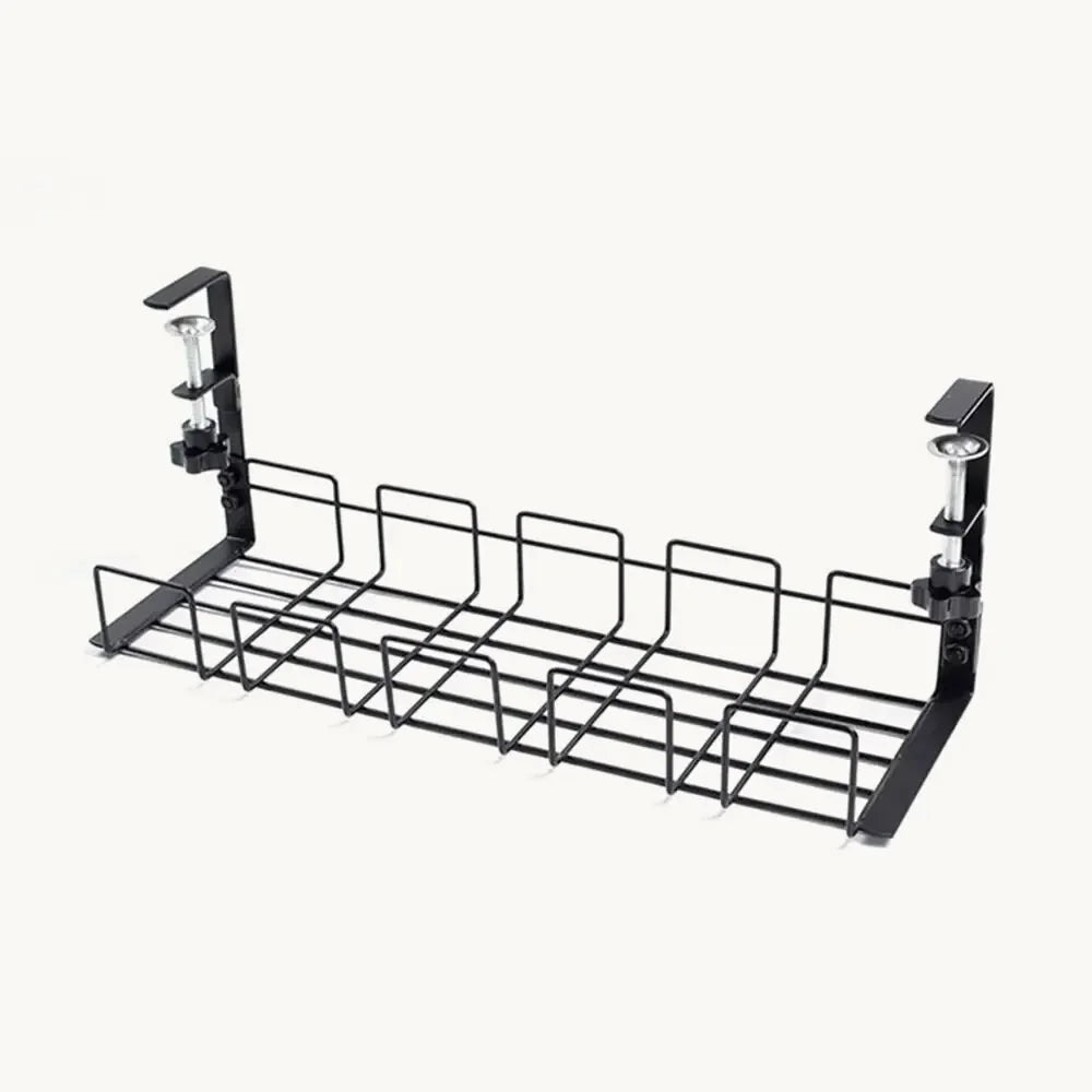 A black powder-coated wire cable tray with two clamp brackets, photographed alone against a warm off-white background.